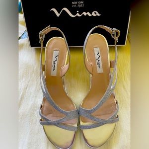 Nina 3 inch heel silver sandals, Size 9.5. Worn once for a wedding.